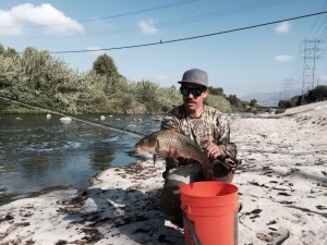 WINNING is what Matus Solobic of Altadena represents with the beautiful common carp. (Jim Burns)